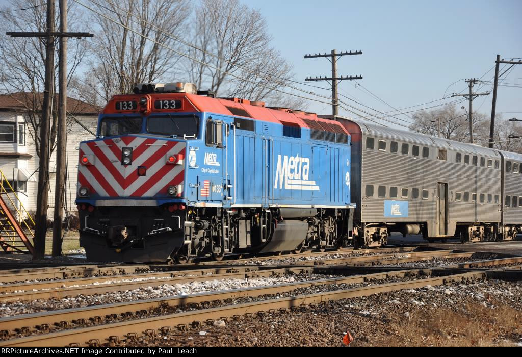 Inbound commuter shoves east towards the station